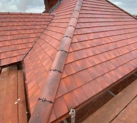 Trident Roofing Ltd: High-quality work from cheap new roofers Plymouth on a modern terracotta tiled roof project.