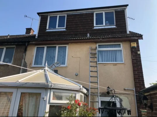 Trident Roofing Ltd providing professional roofing repairs Plymouth on a residential property with dormer windows.